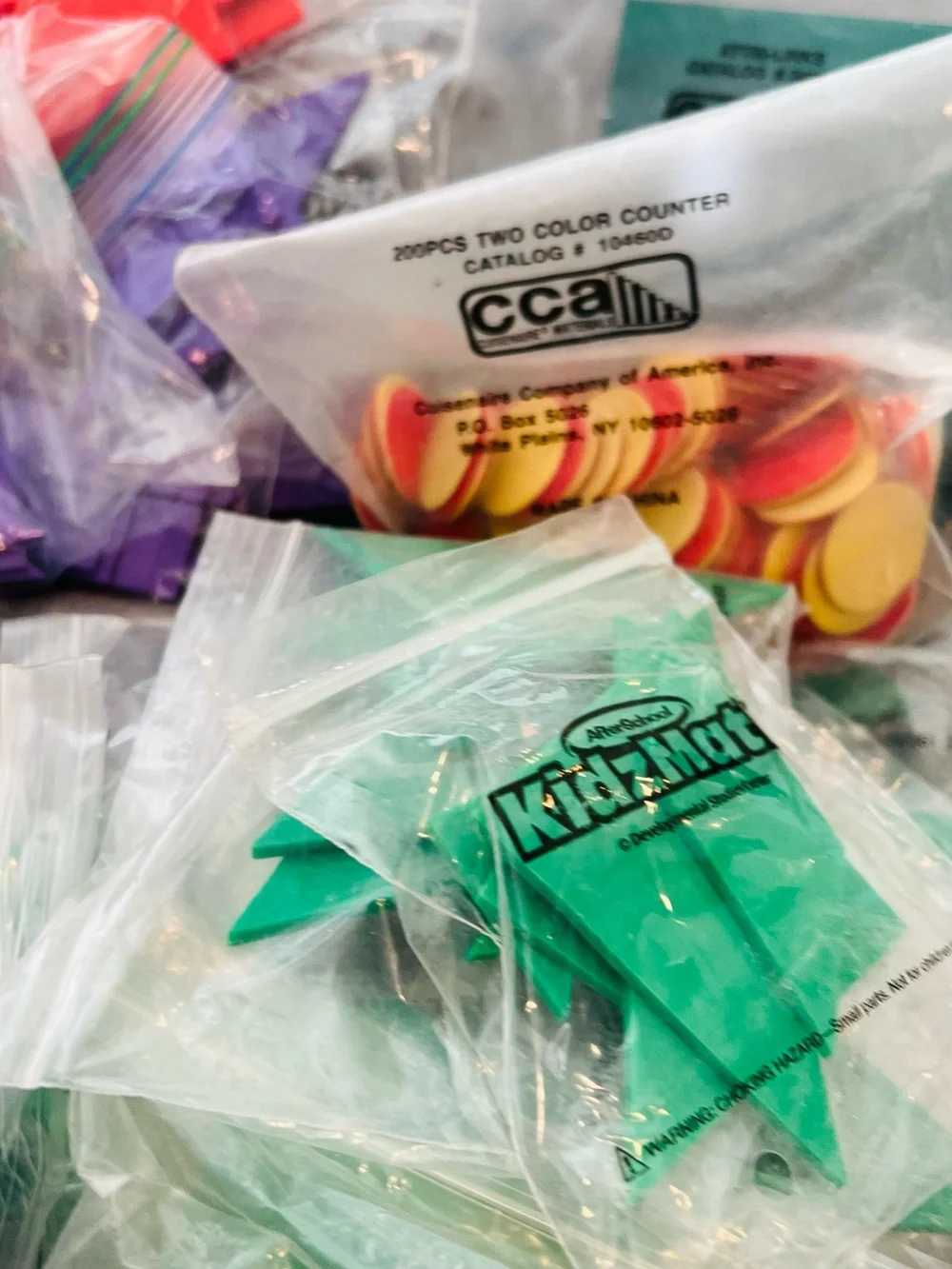 New after school math learning Triangles Purple , blue, yellow, green,and Red